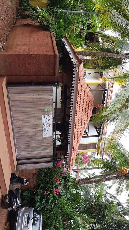 Hotel De Hibiscus Candolim Exterior foto